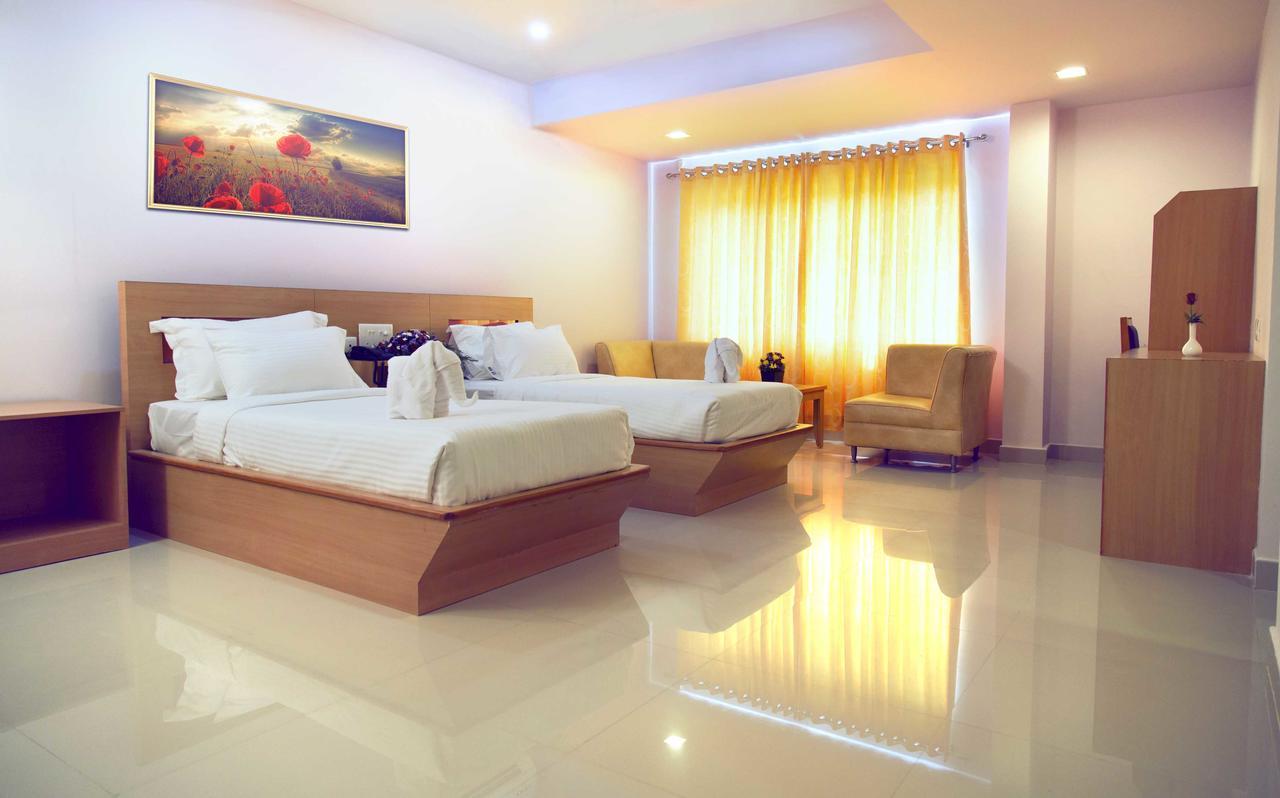 Hotel Rainbow Suites Kannúr Kültér fotó